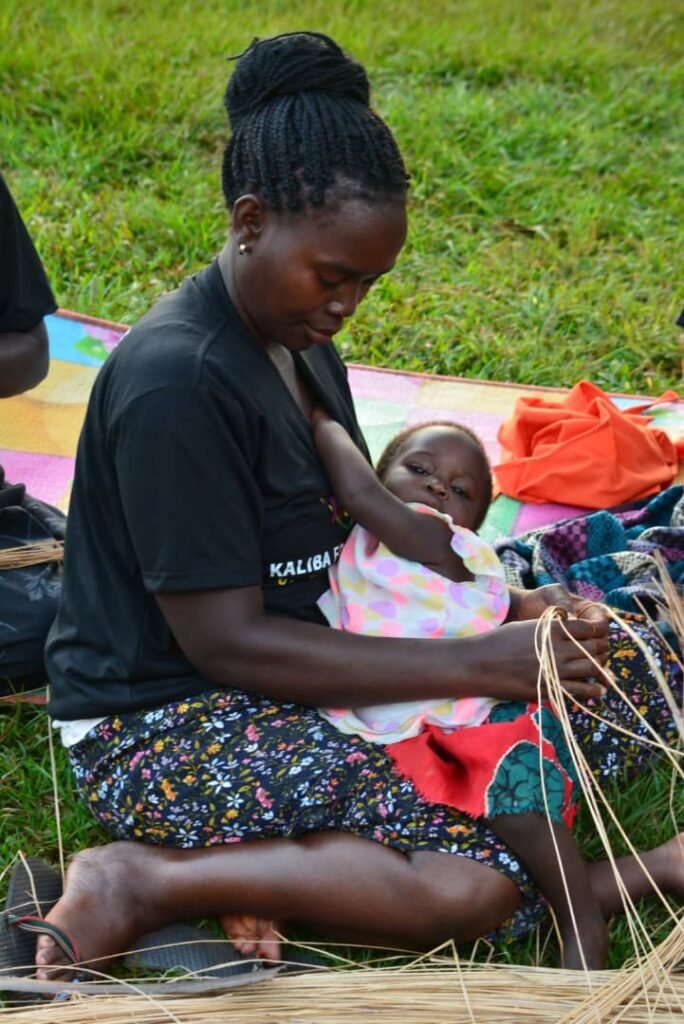 A picture of One of the beneficiaries doing craft work